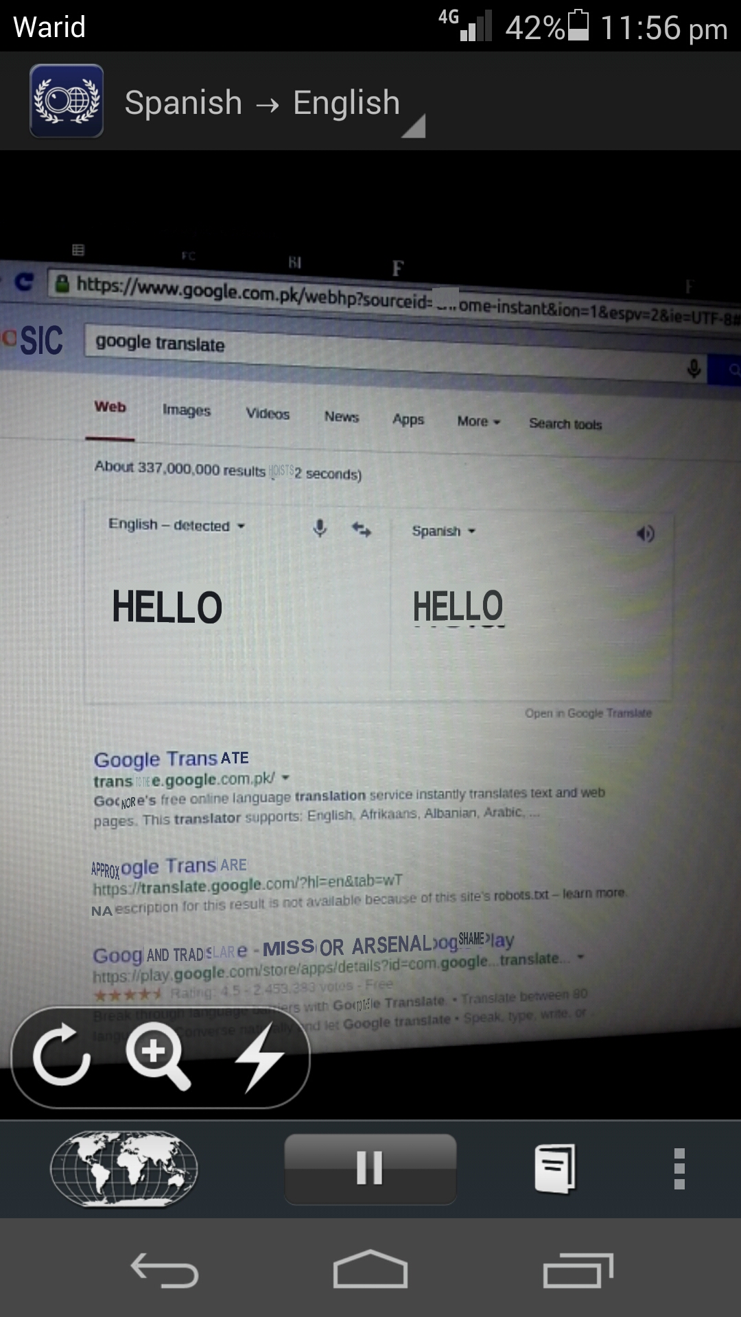 World Lens translating Spanish text to English. The text on the right was the Spanish word for hello, which has been translated to the English word hello.